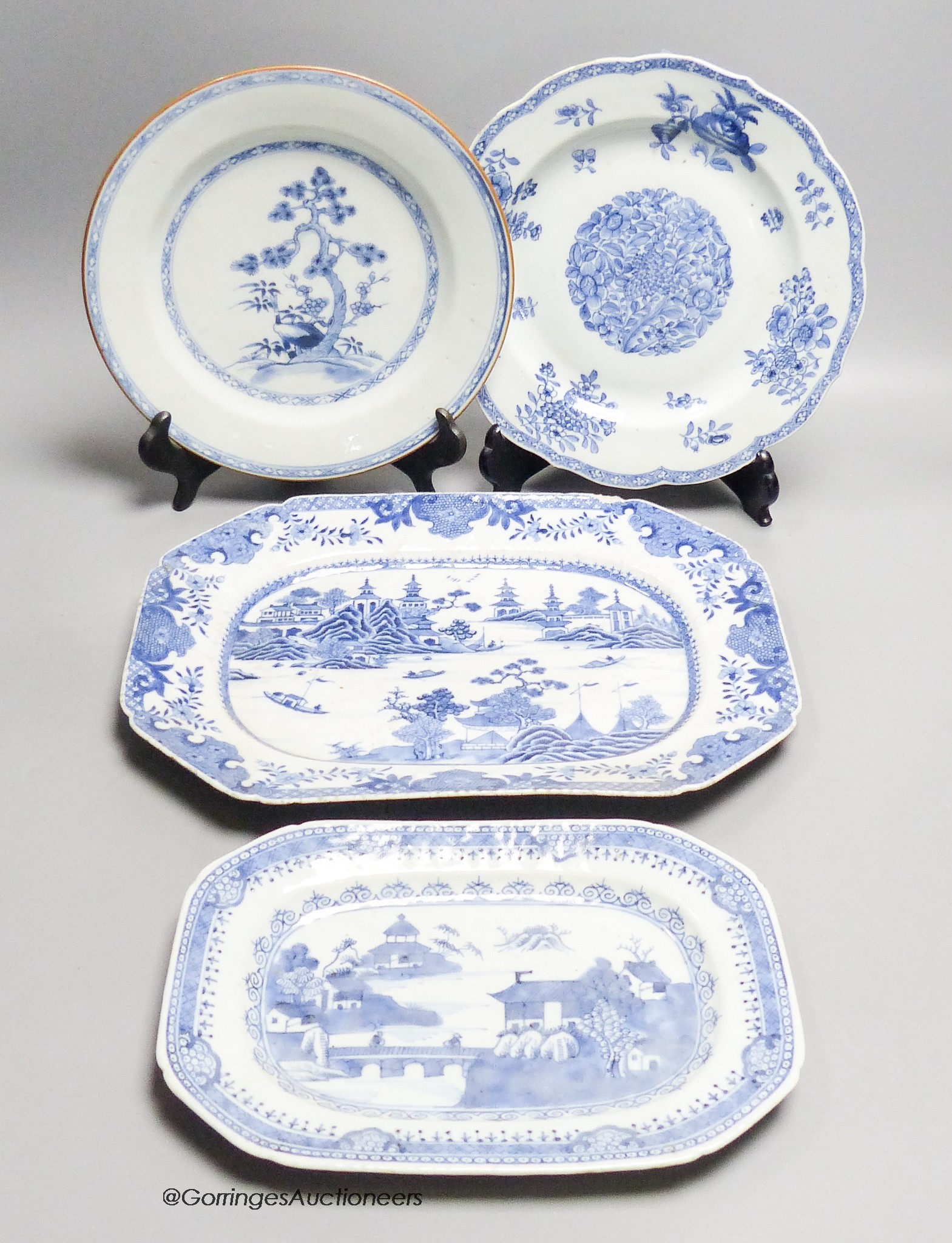 Two 18th century Chinese circular export plates and two canted rectangular dishes, 32 x 23cm